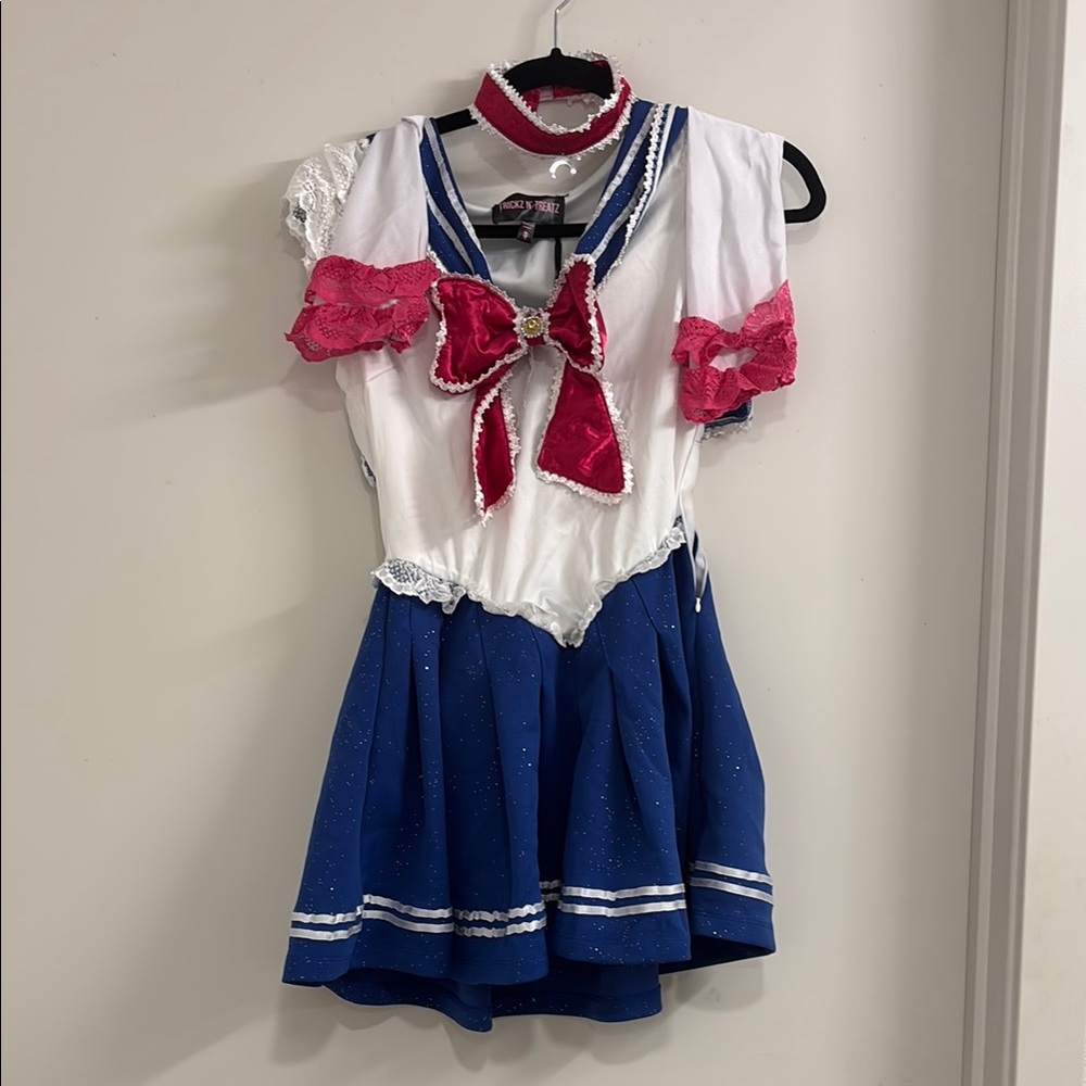 Sailor-Inspired Costume with Red Bow
